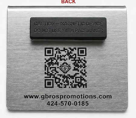 The back of a silver name badge: a magnet, a QR code with the emblem, and our website and phone number